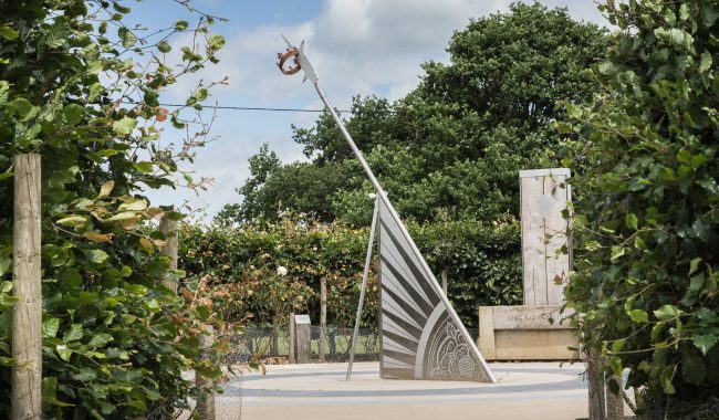 Sundial Thru Hedges Scaled Aspect Ratio 650 380